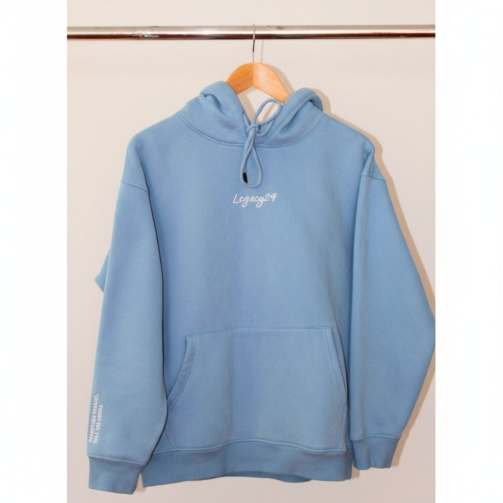 Legacy29 Resilience Collection: Boundless Blue Hoodie in soft 100% cotton with fleece lining, featuring an embroidered logo on chest and arm.