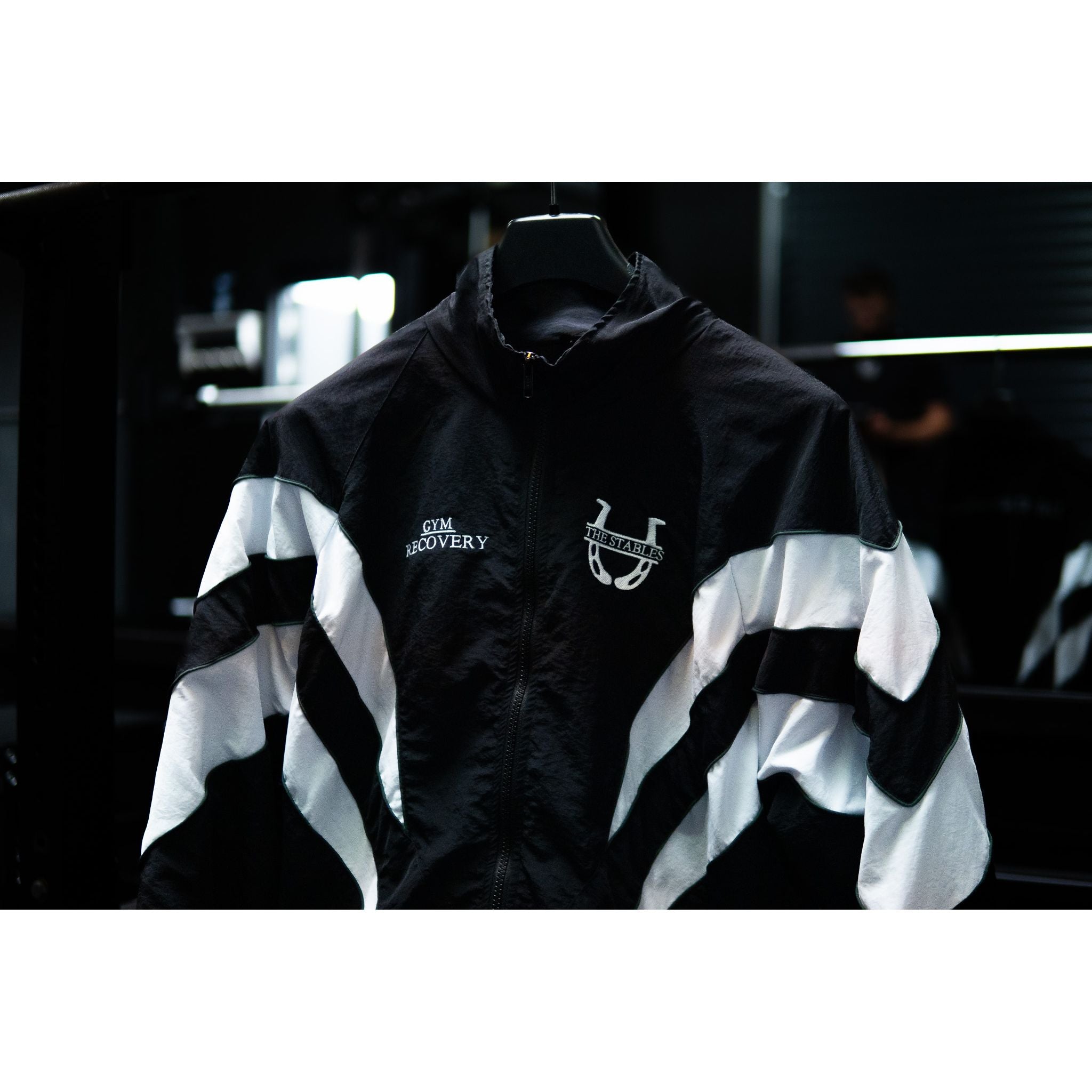 The Stables Track Jacket by Legacy29 | Black, White & Green Trim | Nylon Crinkle