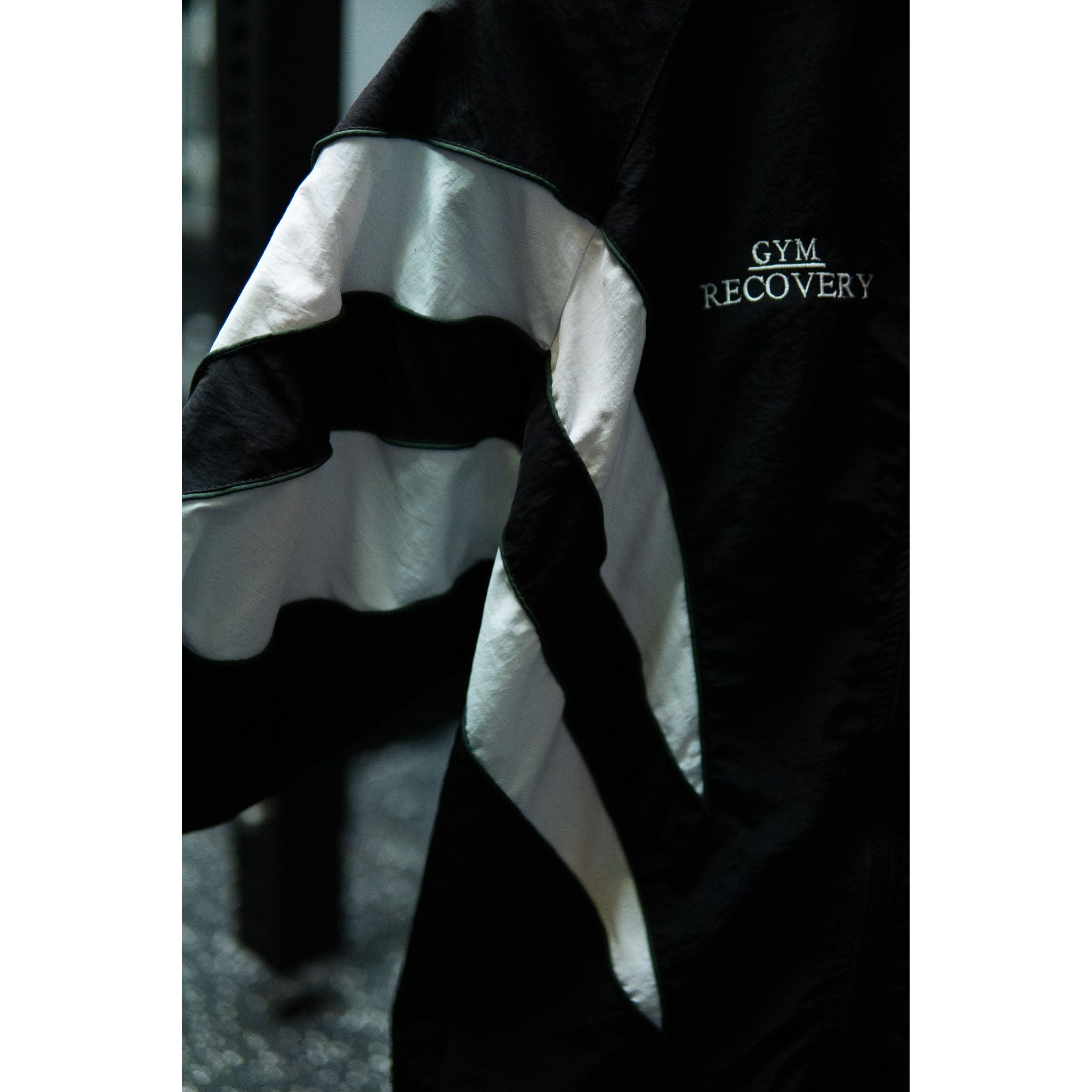 The Stables Track Jacket by Legacy29 | Black, White & Green Trim | Nylon Crinkle