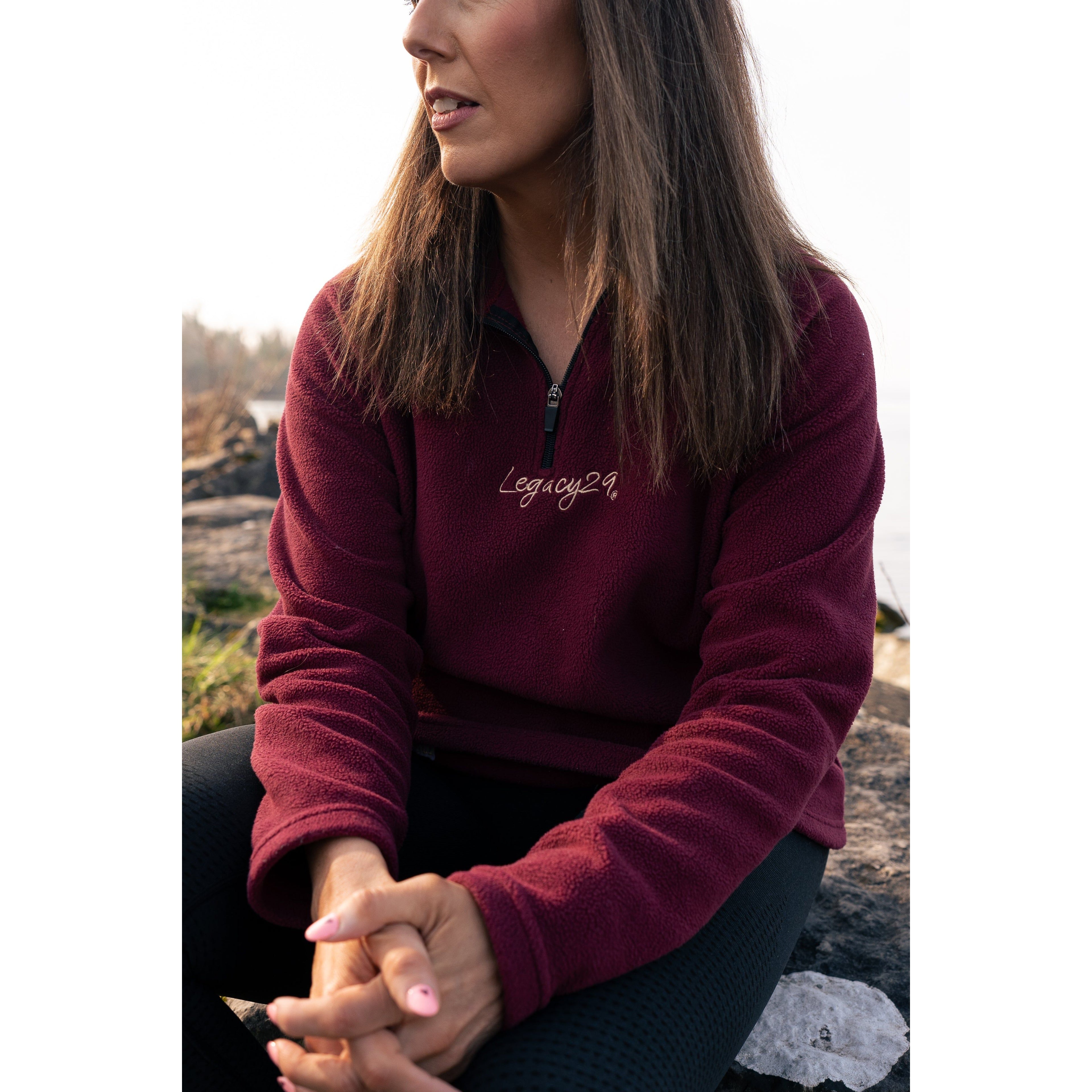 Garnet Red Fearless Fleece by Legacy29, a cozy mental health support apparel featuring a half-zip design. Soft fleece fabric promotes warmth and resilience.