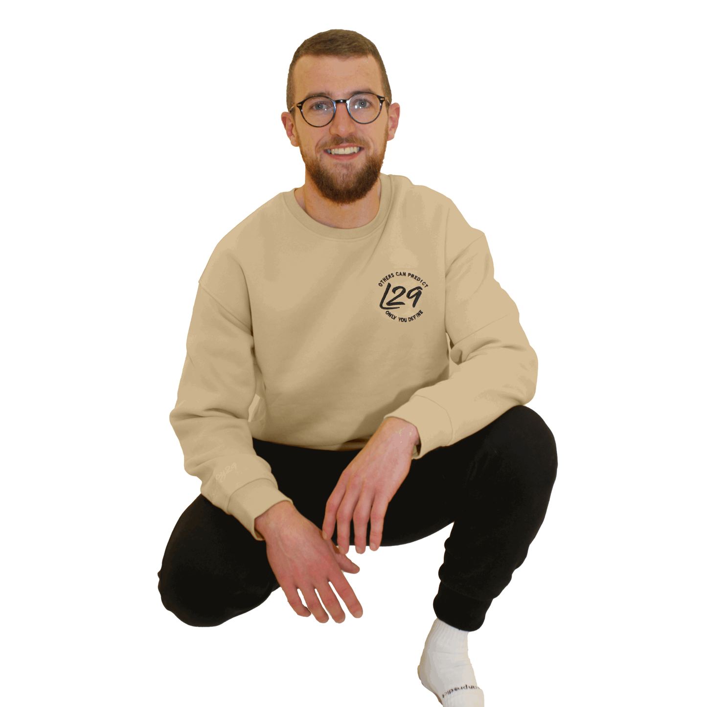 Model wears Legacy29 Beige Jumper in size Medium