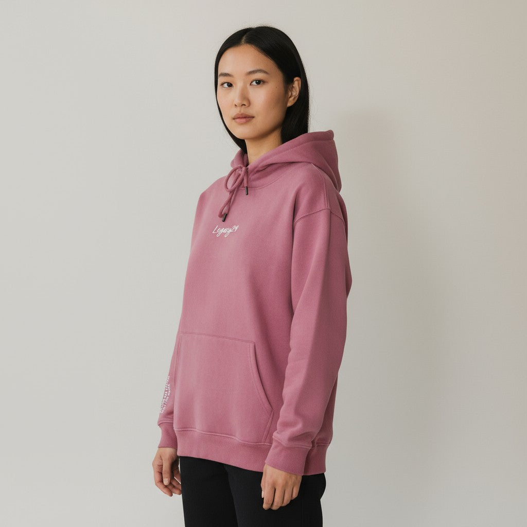 Person wearing a red hoodie with text on a plain background