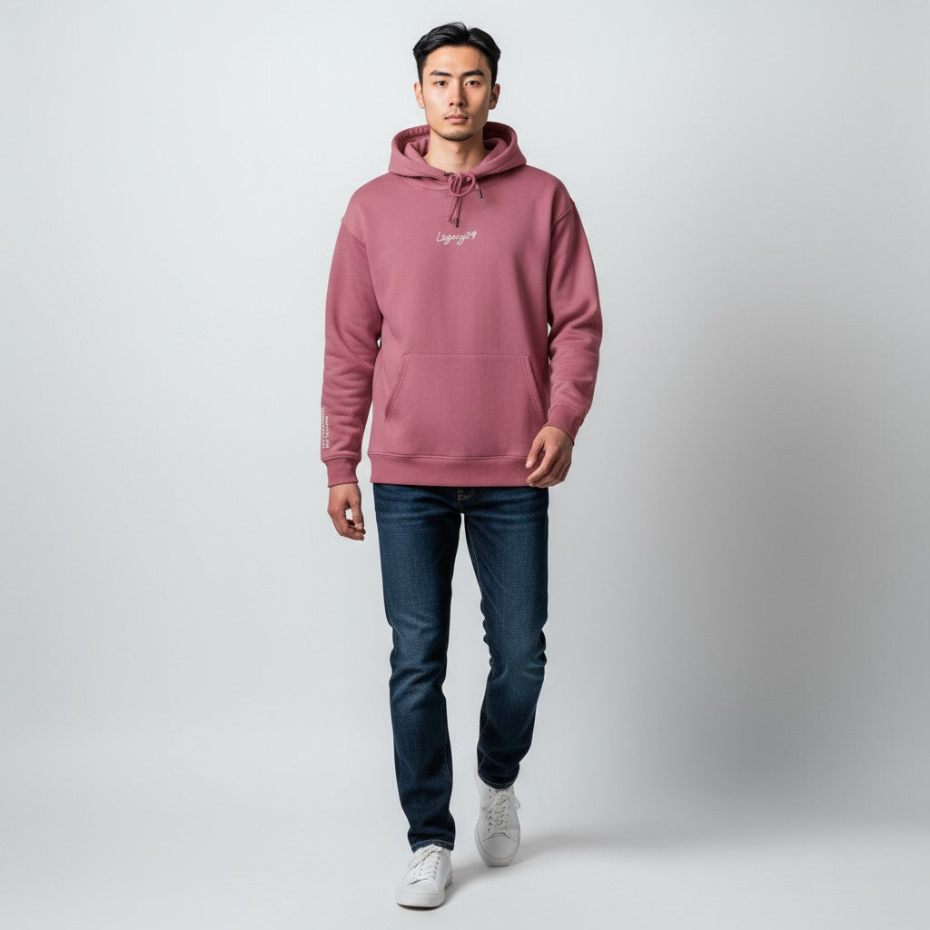 Person wearing a red hoodie with a logo on a white background