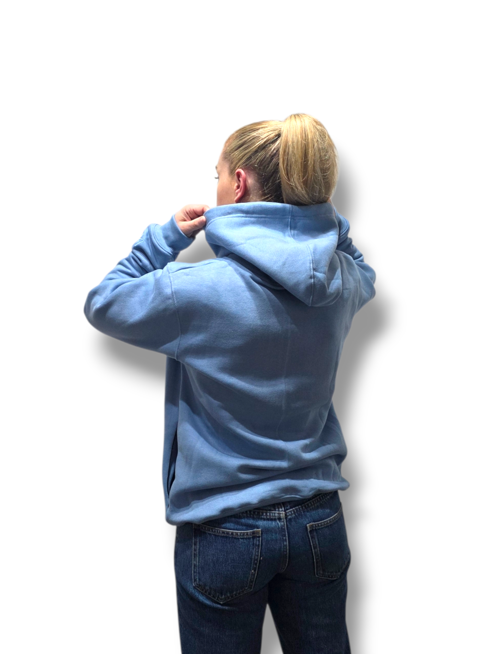 Person wearing a blue hoodie from behind on a white background