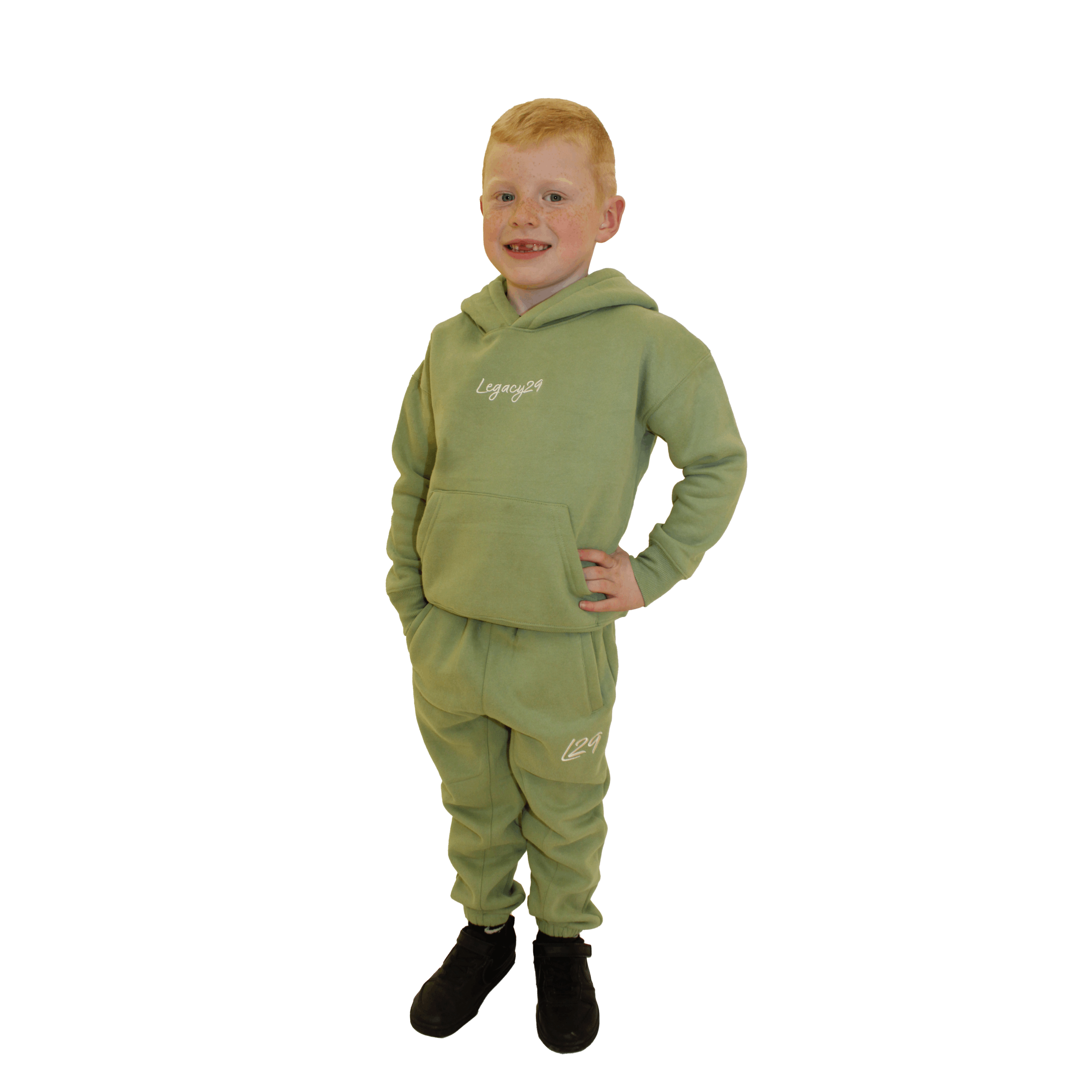 Young boy in Legacy29 junior khaki green hoodie and tracksuit bottoms set. Comfortable and stylish kids' outfit for all-day wear.