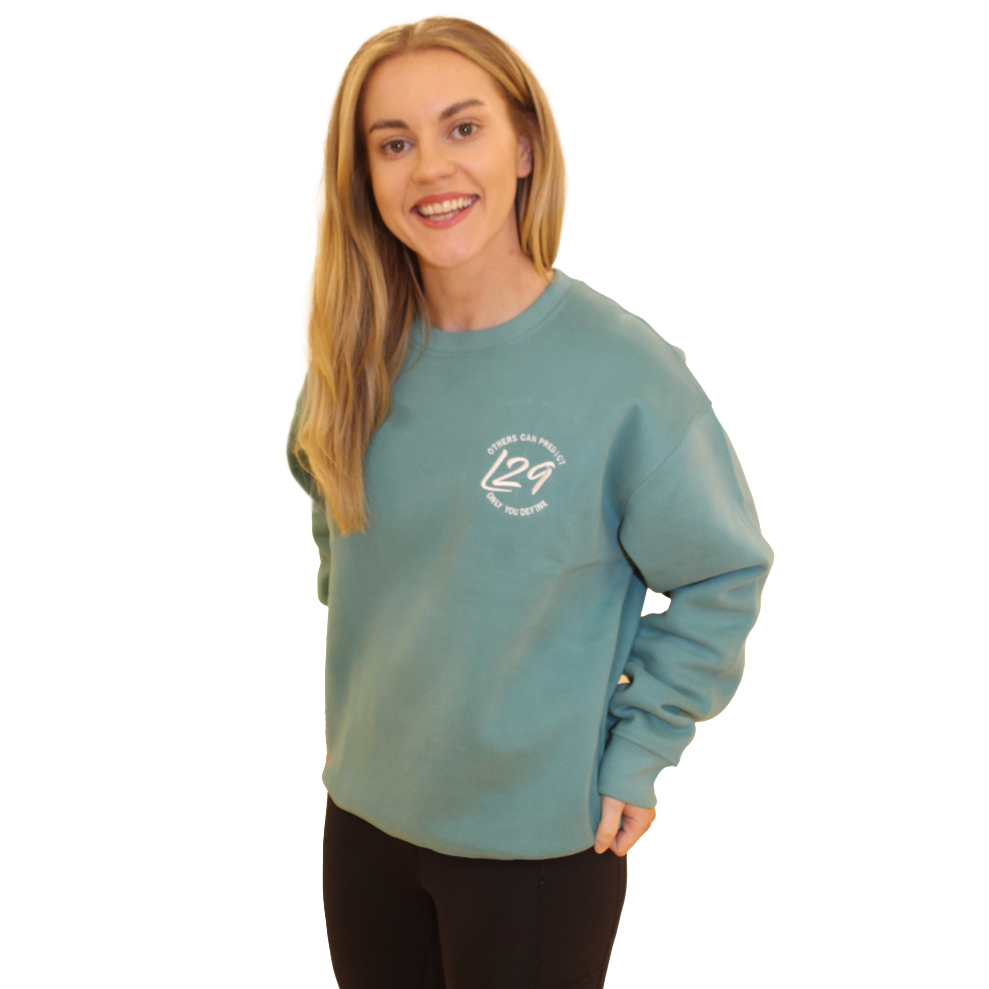 Model wears Legacy29 Teal Jumper in size extra small